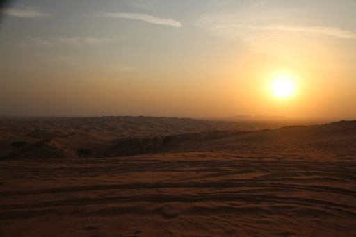 A mesmerizing view of the sunset over a desert