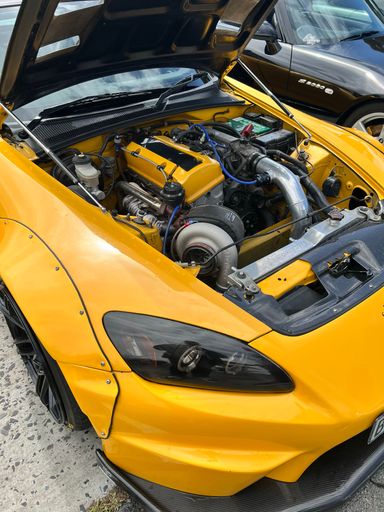 A beautiful shot of a yellow racing car