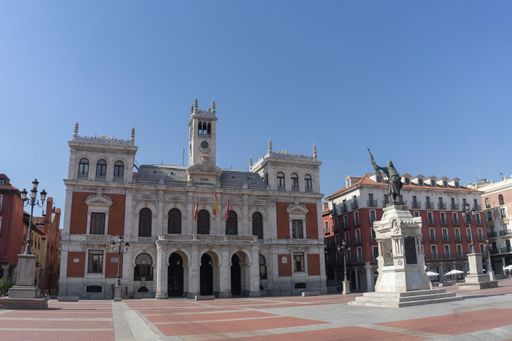 The large and spacious town hall in Valladolid main square with blue sky, Castilla y Leon, Spain