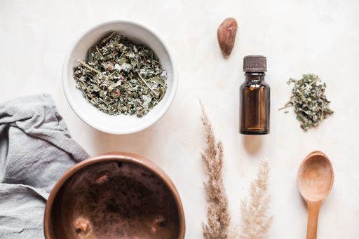 A vertical high angle shot of natural eco-friendly natural body care herb cosmetics ingredients