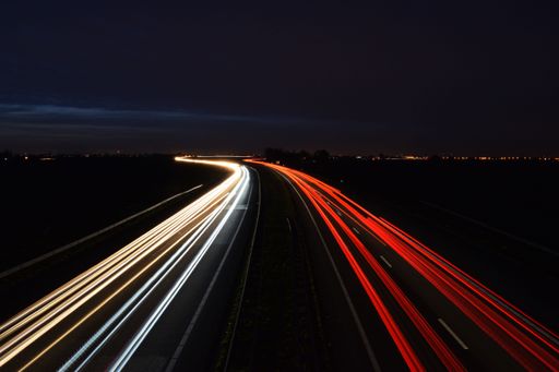 Highway cars driving to the horizon