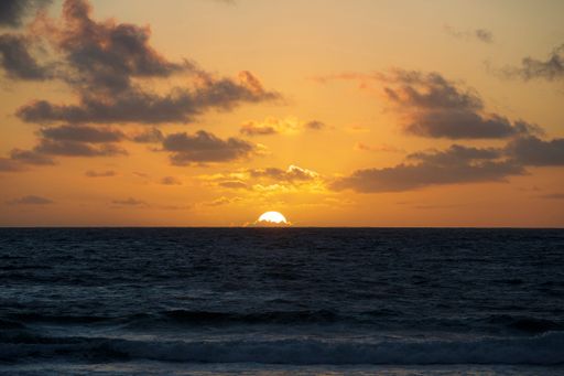 A beautiful golden sunset over the sea.