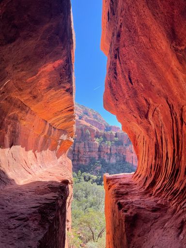 A vertical shot of the Subway Cave on a sunny day in Sedona, Arizona, United States