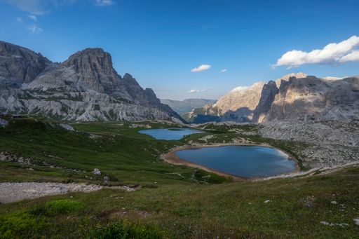 A landscape of Tre Cime di Lavaredo Hikes mountains with lake in Dolomites, Italy