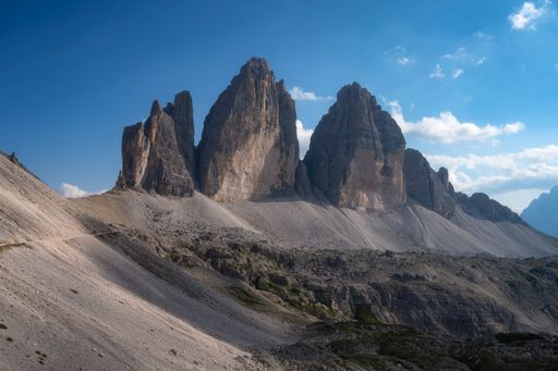 A landscape of Tre Cime di Lavaredo Hikes mountains in Dolomites, Italy with blue sky