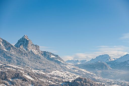 A scenic view of Grosser Mythen mountain range covered with snow in Switzerland