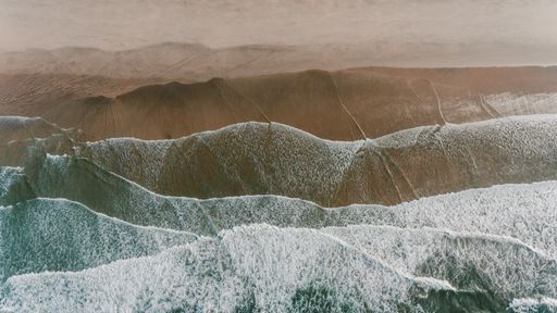 An amazing shot of sea waves during heavy rain - great for a cool background or wallpaper