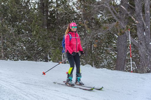 Grandvalira, Andorra : 2020 December 27 : Woman doing Ski Mountaineering in the mountains in the Pyrenees in Europe in winter 2020.