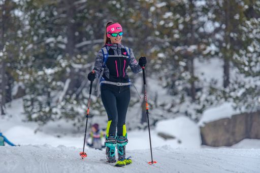 Grandvalira, Andorra : 2020 December 27 : Woman doing Ski Mountaineering in the mountains in the Pyrenees in Europe in winter 2020.