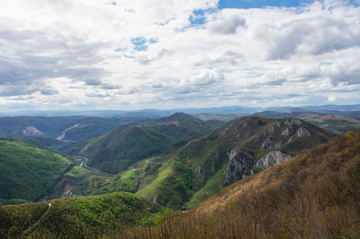 A mesmerizing view of a beautiful mountainous landscape against a cloudy sky in Serbia