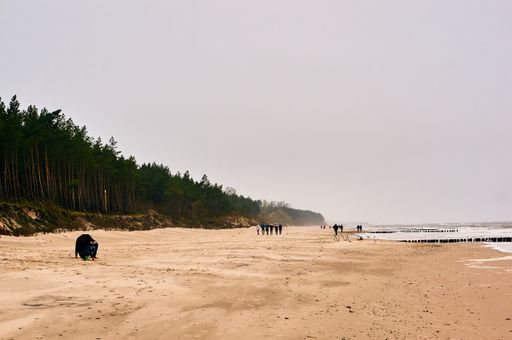 A beautiful shot of the beach in Sarbinowo, Poland during the winter season