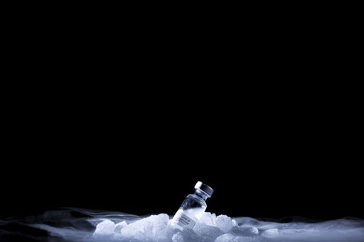 A Covid-19 vaccine preserved at very low temperature with steam of dry ice - new normal concept