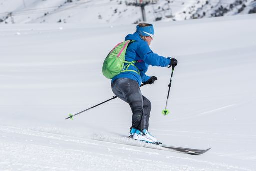 Grandvalira, Andorra: 2020 December 31: Woman pratice Ski mountaineering going up the Pyrenees mountains in Andorra on 2020.