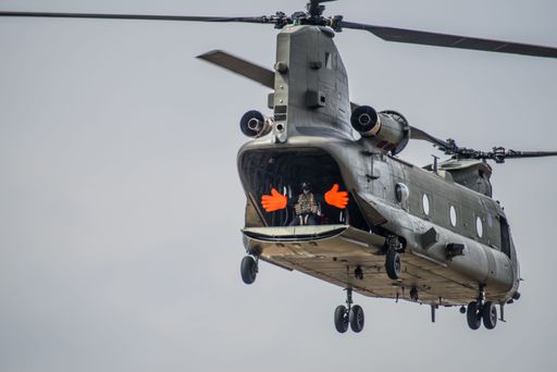 The funny big red hands waving from the helicopter cockpit in the RIAT airshow