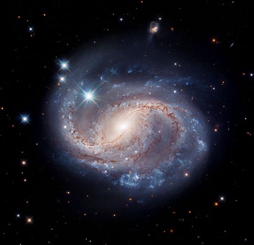A beautiful spiral galaxy with bright stars. Space, universe backdrop.