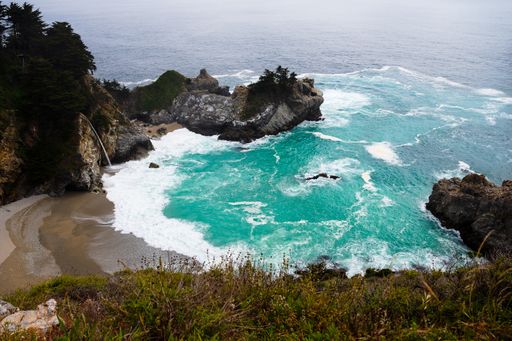 An aerial view of a beautiful rocky coast in California, USA