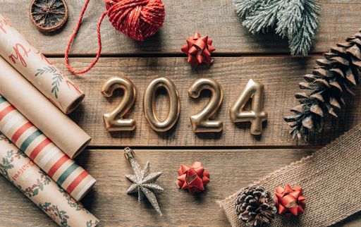 Overhead photo of golden New year 2024 numbers on wooden background with christmas decorations