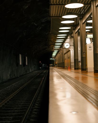 A vertical shot of the interior of an airport train station