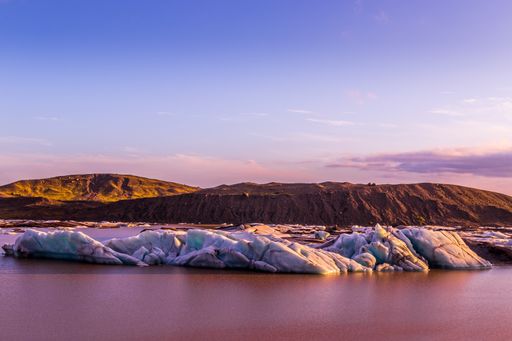 A beautiful view of melting glaciers under a beautiful lilac sky in Iceland