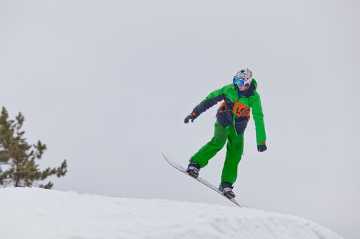 A skier making a jump on a slope