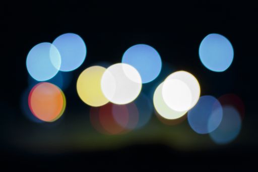 A cool background of colorful bokeh lights at night
