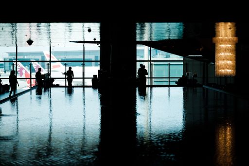 A view of the water and planes from Qatar Business lounge