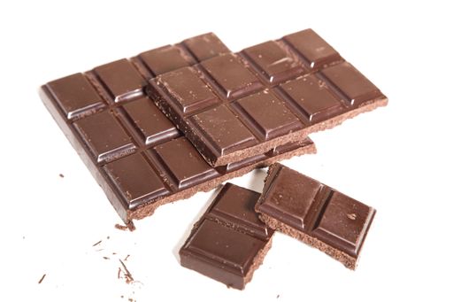 A closeup of delicious chocolate bars isolated on a white background