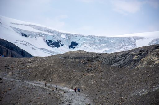 A beautiful shot of mountains covered with snow on a winter day
