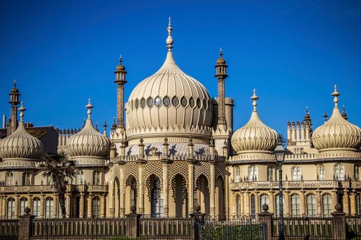 The Brighton Royal Pavilion buildings under blue sky