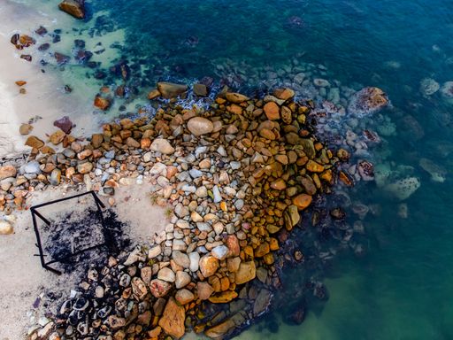This photo was taken from a bird's eye view by the beach in Puerto Vallarta. The evening before this little shack got hit by lightning and was burned.