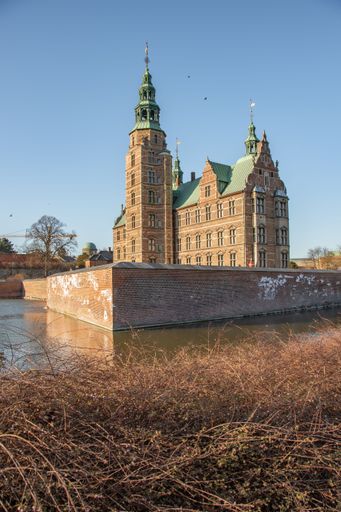 A vertical shot of the beautiful architecture of the Rosenborg castle located in Copenhagen, Denmark