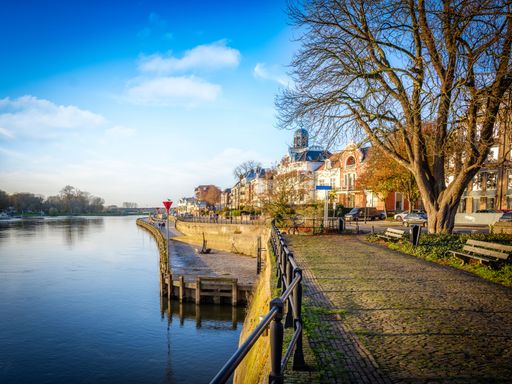 A beautiful riverside town in the Netherlands captured on a sunny day