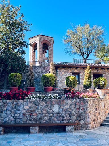 A vertical shot of the beautiful architecture of Grand Meteoron Courtyard located in Greece