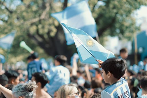 A crowd of Argentinian people celebrating Qatar 2022 Victory Fifa World cup