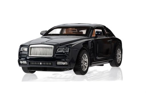 A black Rolls-Royce Phantom luxury car model figure on a white background