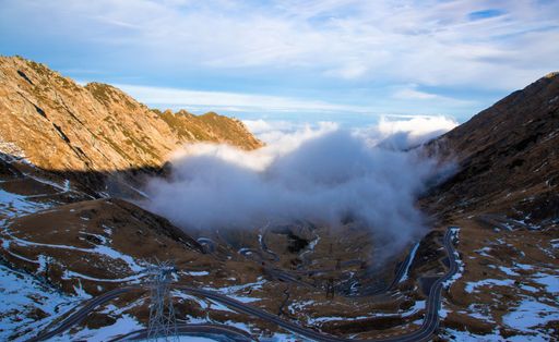 Fog in the valley in the Fagaras mountains on the Transfagarasan road - Romania