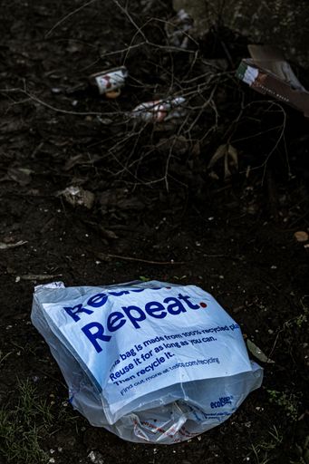 A vertical shot of the reusable garbage in the trash