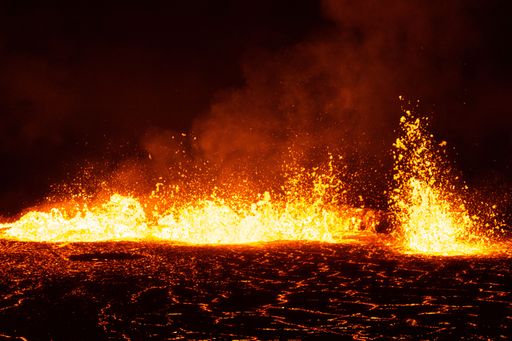 An aerial view of the volcano eruption at night
