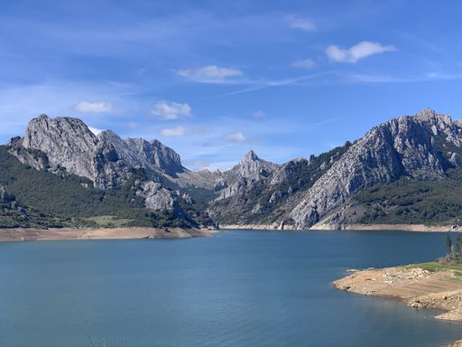 A beautiful shot of the lake and mountains at Riano reservoir, Spain