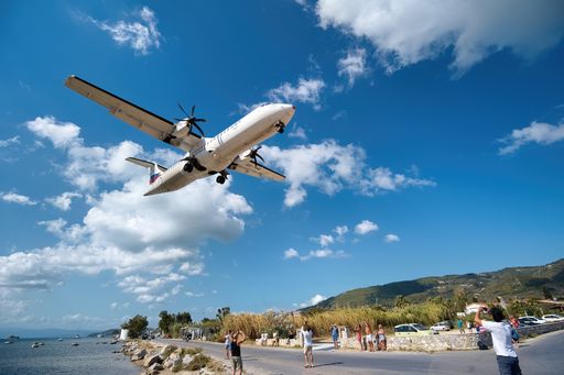 The Skiathos Airport . Located right next to a beach, it attracts adrenaline-loving tourists trying to click selfies with aircrafts right overhead.