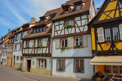 The streets of Colmar, in Alsace, in France with typical colorful houses in the summer