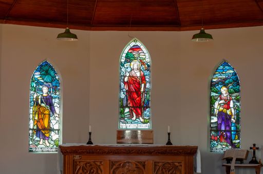 The Three stain glass windows with Christ, Isaac and Rebekkah in All Saints Church in New Zealand