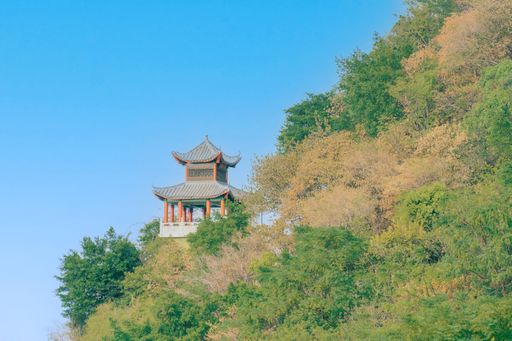 A Chinese gazebo on the hillside under the blue sky in Liuzhou, Guangxi, China.