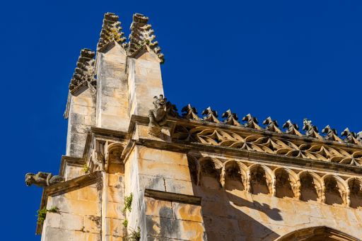 A low-angle view of ancient buildings on a sunny day
