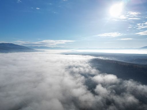 A bird's eye view of a cloudy sky during a daytime