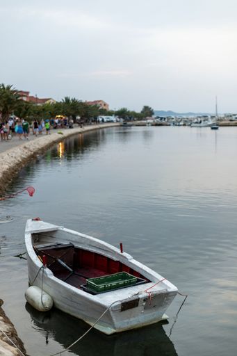 Small harbor with yacht and sail boats in Bibinje village at sunset in Croatia
