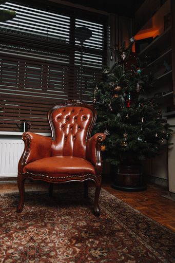 A vertical shot of a brown Christmas chair in the Netherlands in the city of Zwolle