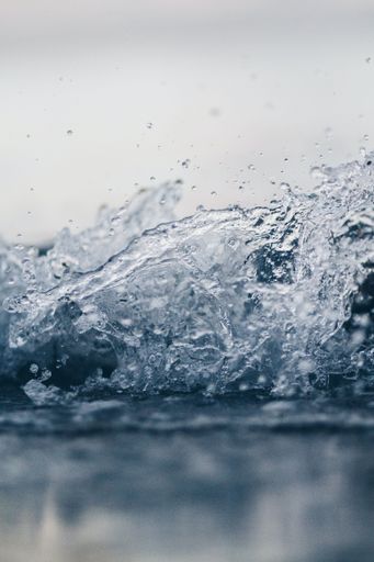 A vertical shot of water splash background