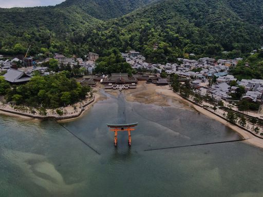 An aerial shot of the Itsukushima Shrine or the Floating Torii Gate on the Island of Itsukushima