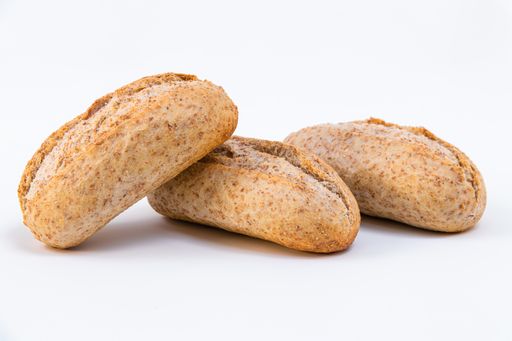A closeup of loaves of healthy white bread isolated on a white backgrou